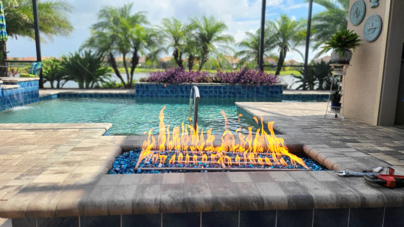 Custom gas fire pit next to pool, Bonita Springs FL