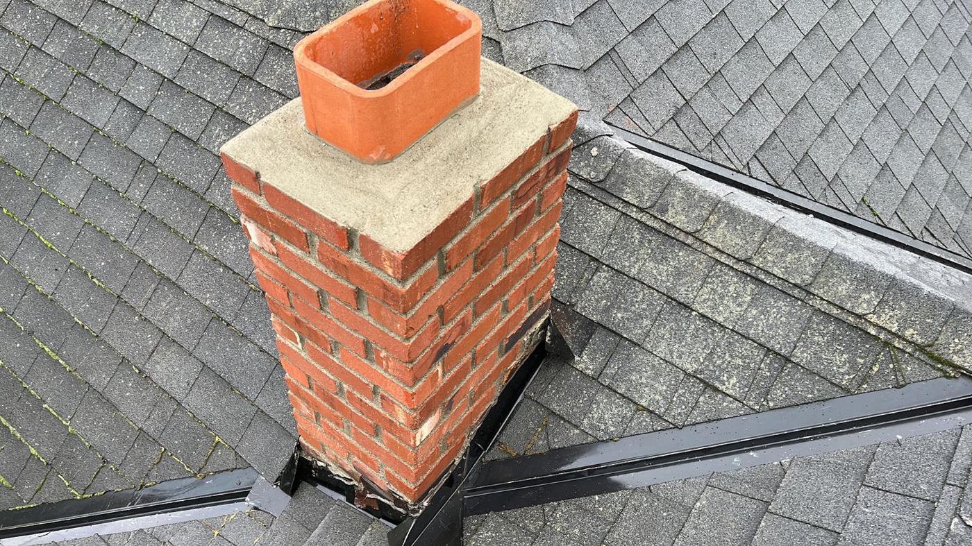 Brick chimney crown on roof, Estero FL